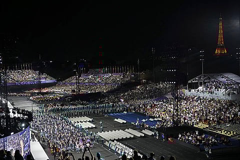 2024 Paralympics Opening Ceremony: The United States, foreground left, and France, center right, athletes parade during the Opening Ceremony
